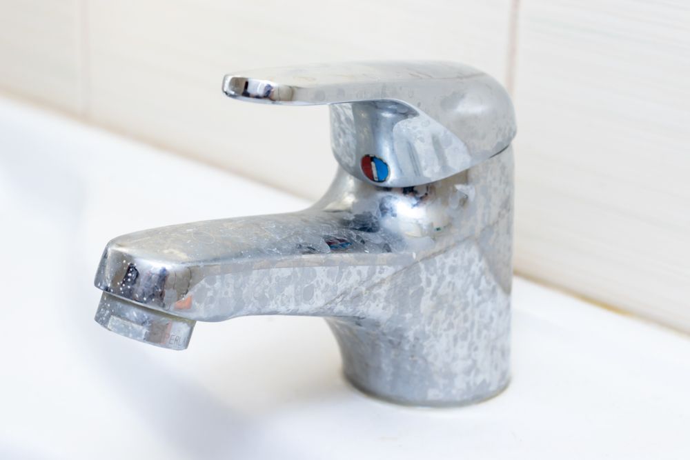 How to clean bathroom and kitcken taps - Clean Hard water deposits