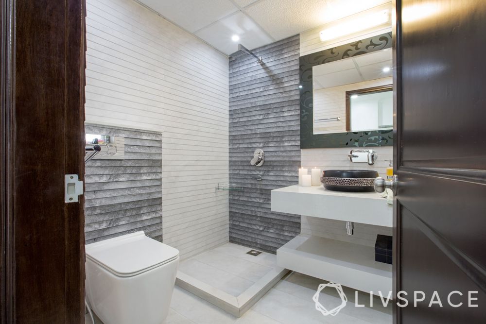shower cubicles-shower enclosure-sink-vanity-mirror-stone wall