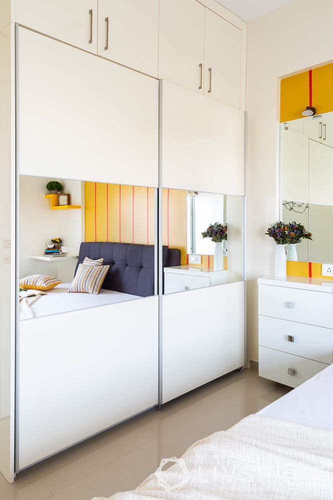 pune interior design-parents room-white sliding wardrobe-lofts-laminate