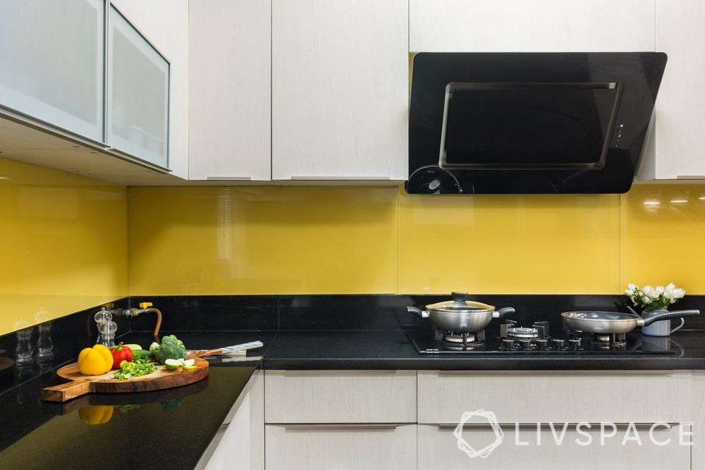 apex athena-kitchen-yellow-glass backsplash-hob unit-granite countertop