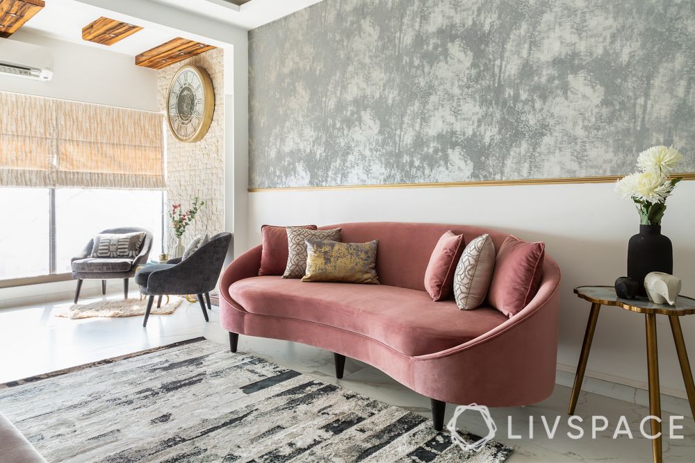 interior design for 2bhk-pink sofa-grey wallpaper