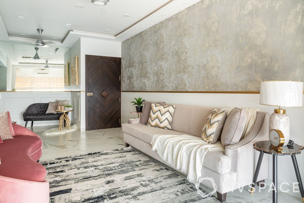 interior design for 2bhk-grey sofa-grey wallpaper