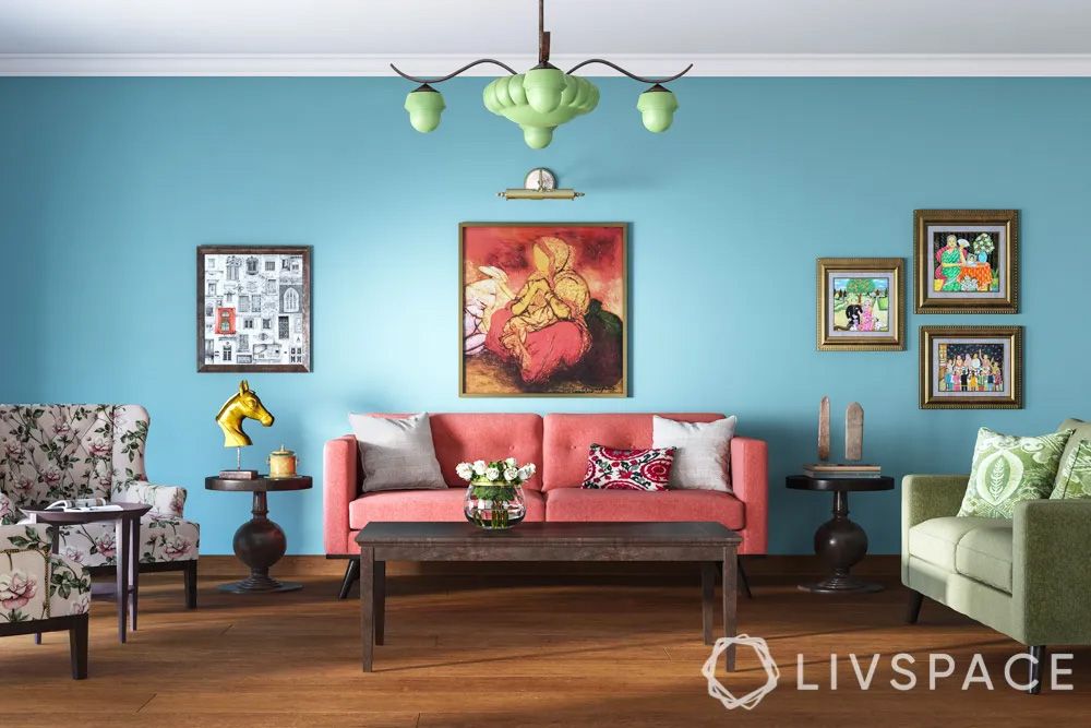 powder-blue-wall-with-coral-sofa-in-living-room