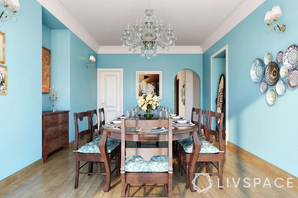 blue-dining-room-wall-with-chandelier