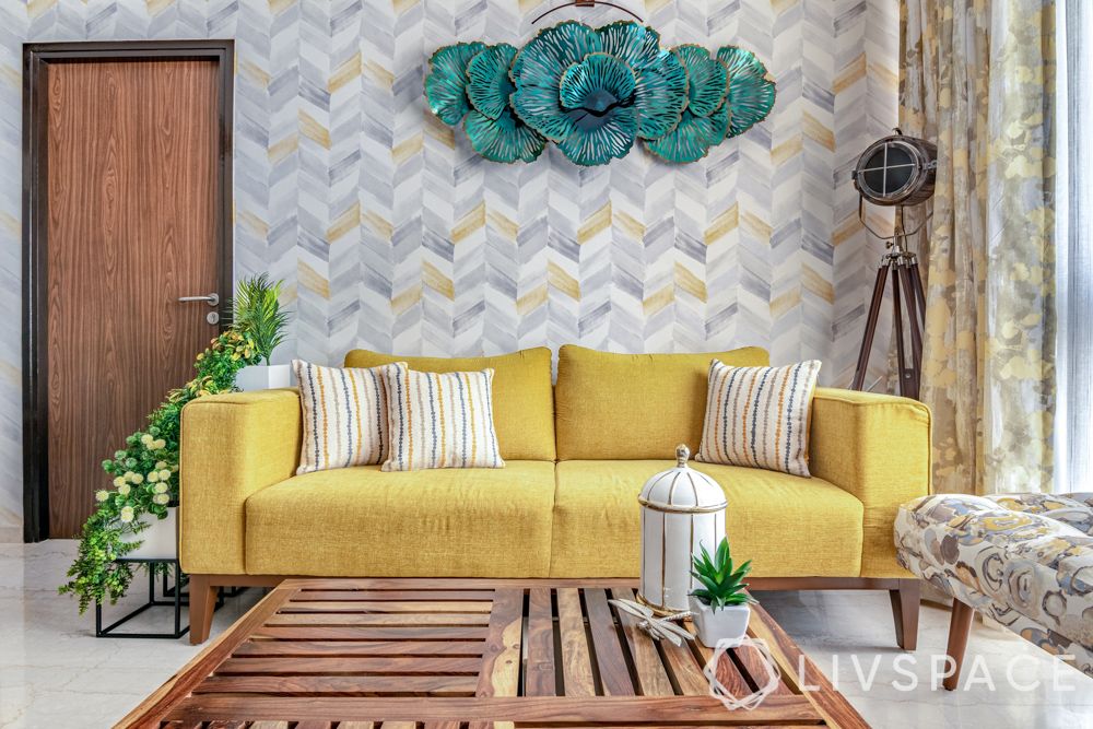 interior design for 2bhk flat-yellow sofa-chevron wallpaper