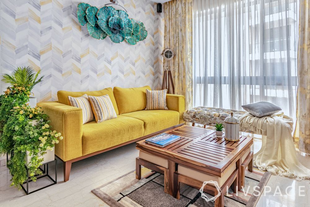 interior-design-for-2bhk-flat-yellow sofa-chevron-wallpaper
