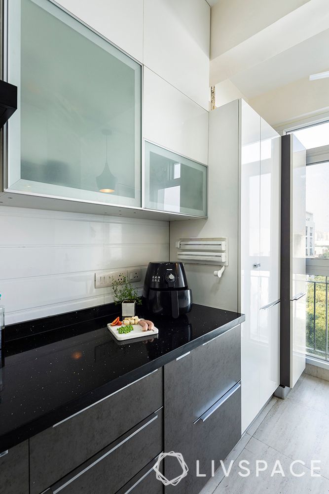 black and white kitchen-retractable drawers-tall unit