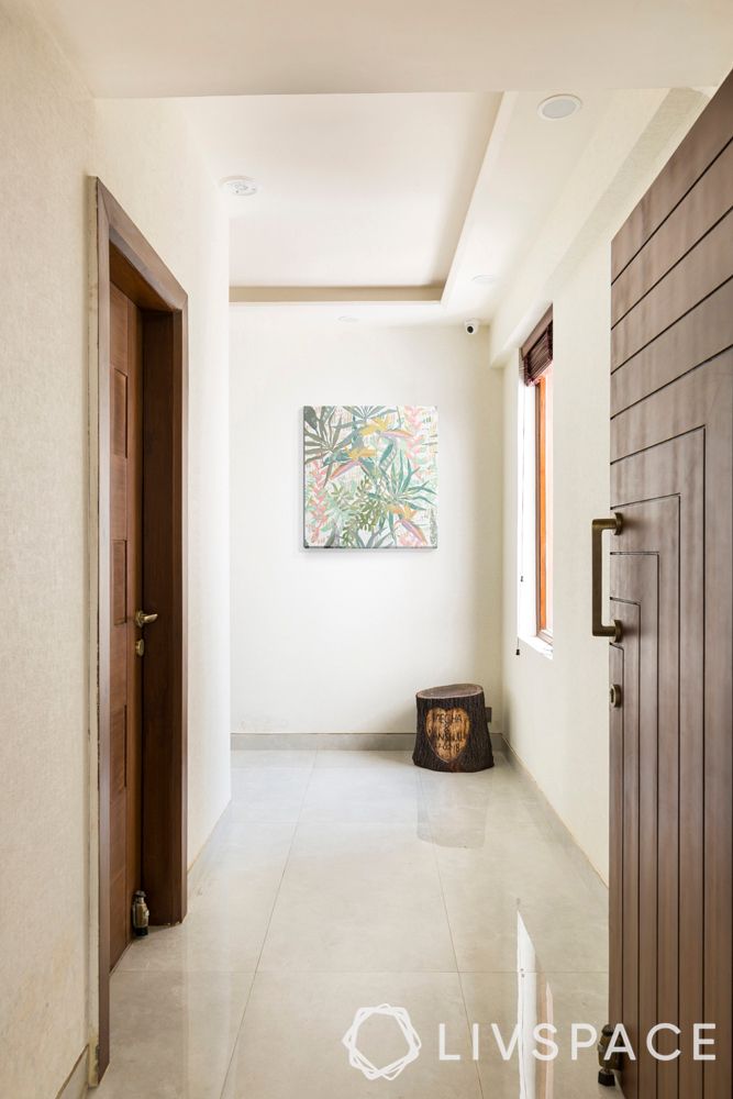 beautiful-houses-photos-foyer-white-wall-false-ceiling-tree-trunk