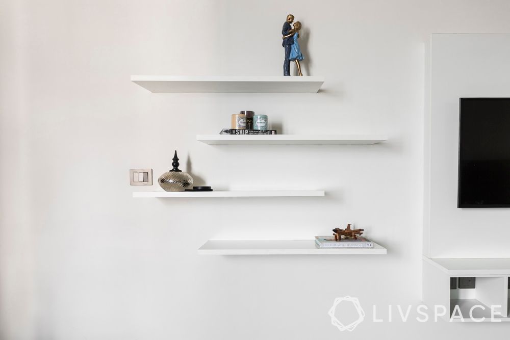 white-shelves-mounted-wall-TV-artefacts
