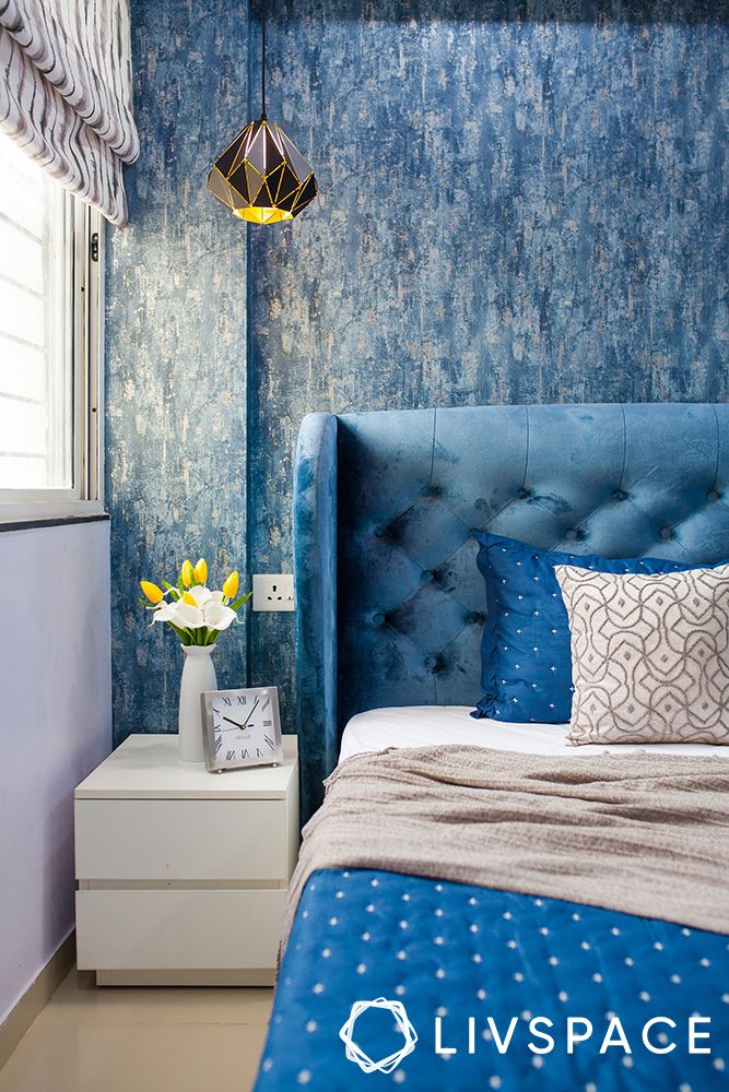 pune interiors-blue headboard-blue wallpaper
