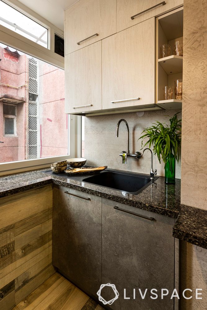 kitchen interiors-sink-tap-cabinets-corner