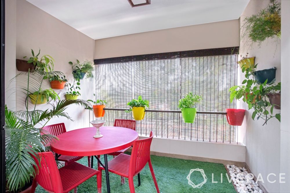 indoor balcony-red furniture-greenery