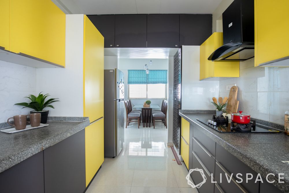 interior for 2 bhk-yellow kitchen-granite countertop