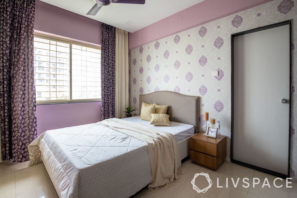 interior for 2 bhk-purple wallpaper-grey headboard
