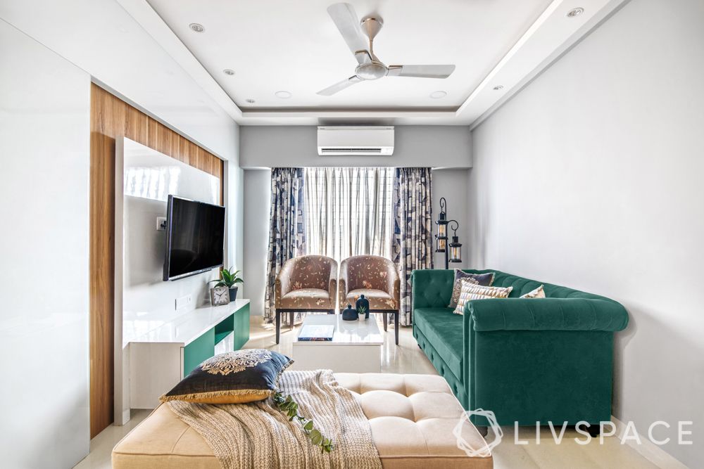 2 bhk flat interiors-living room-emerald green sofa