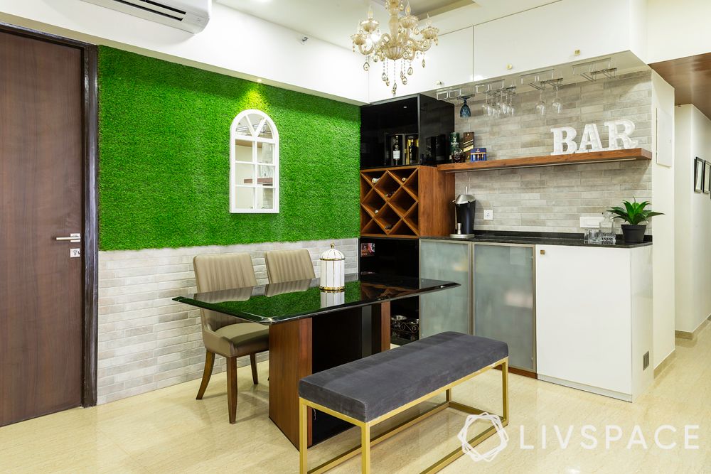  livspace home design-artificial turf on wall-dining area with bar