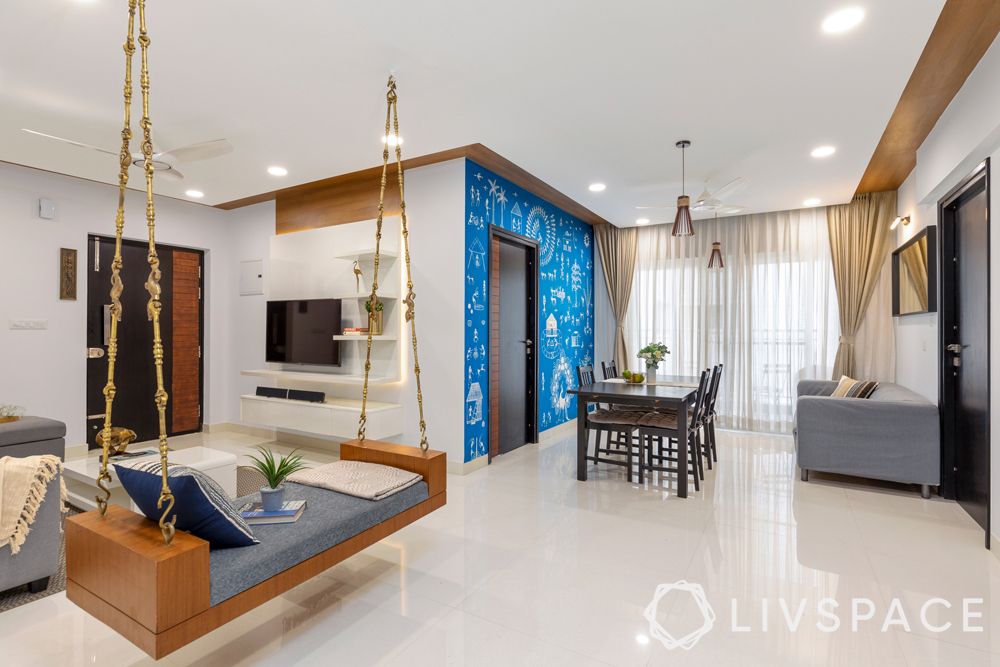  indian living room-swing designs-blue warli wall

