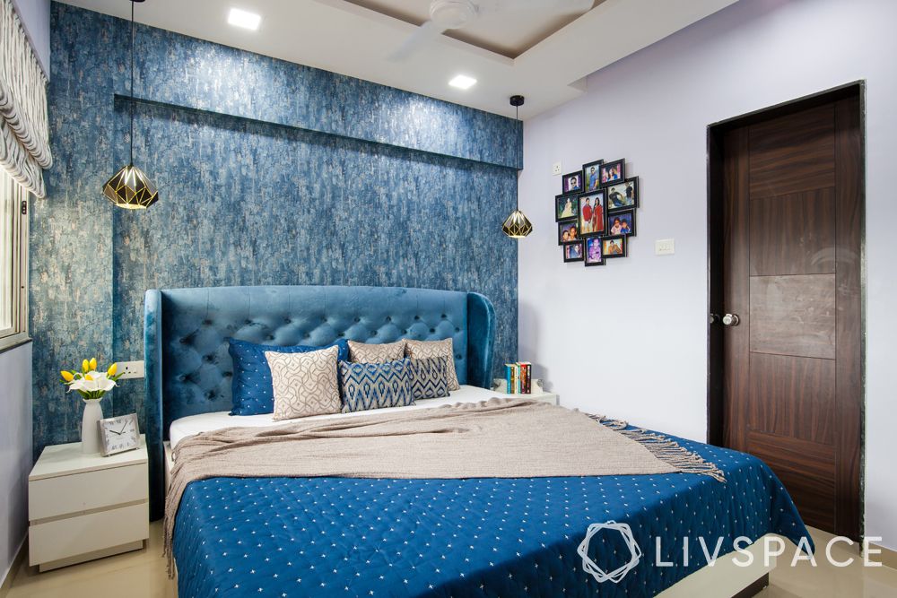 budget interior design-blue wallpaper-blue headboard
