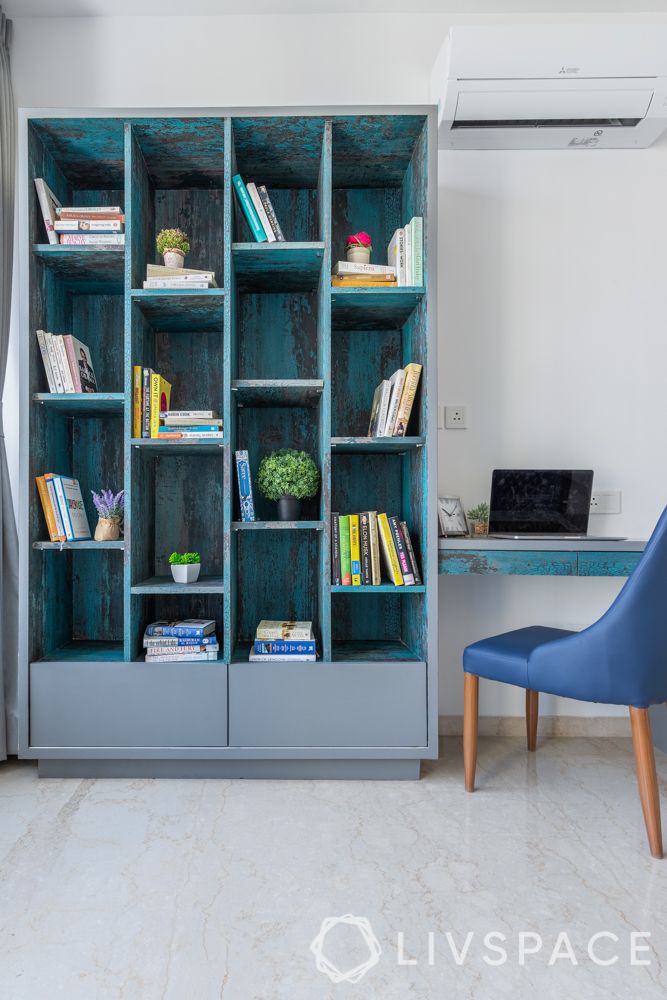 three bhk flat interior -blue book shelf-open book storage