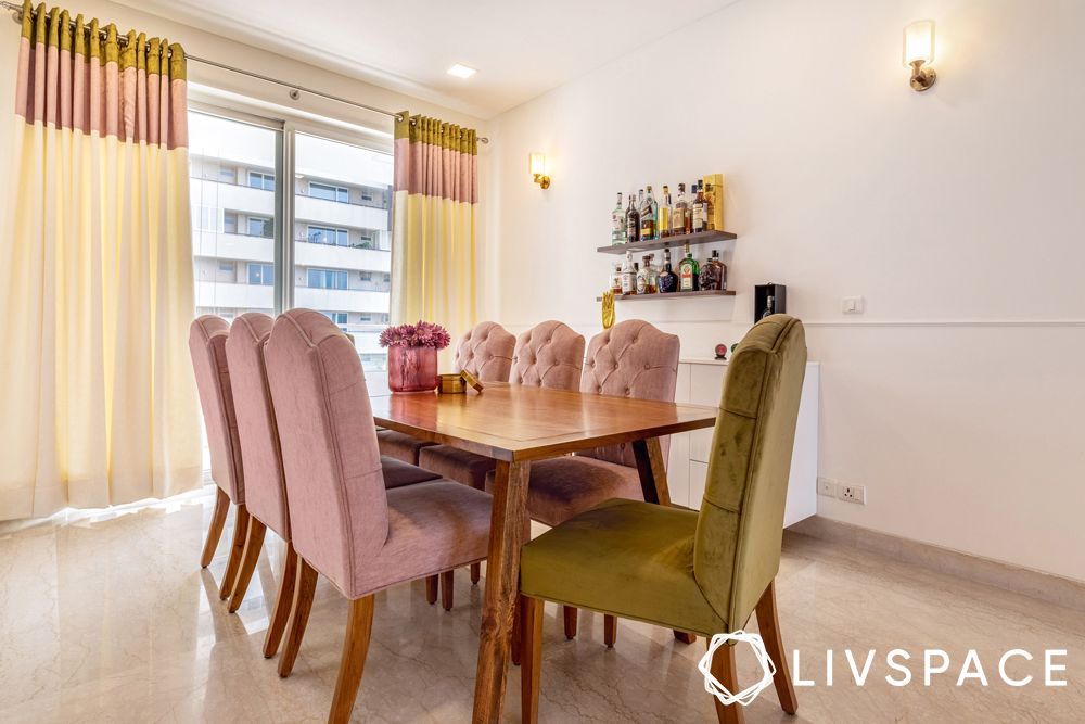 4bhk-dining-room-dusty-pink-chairs-olive-green-chair-wooden-table
