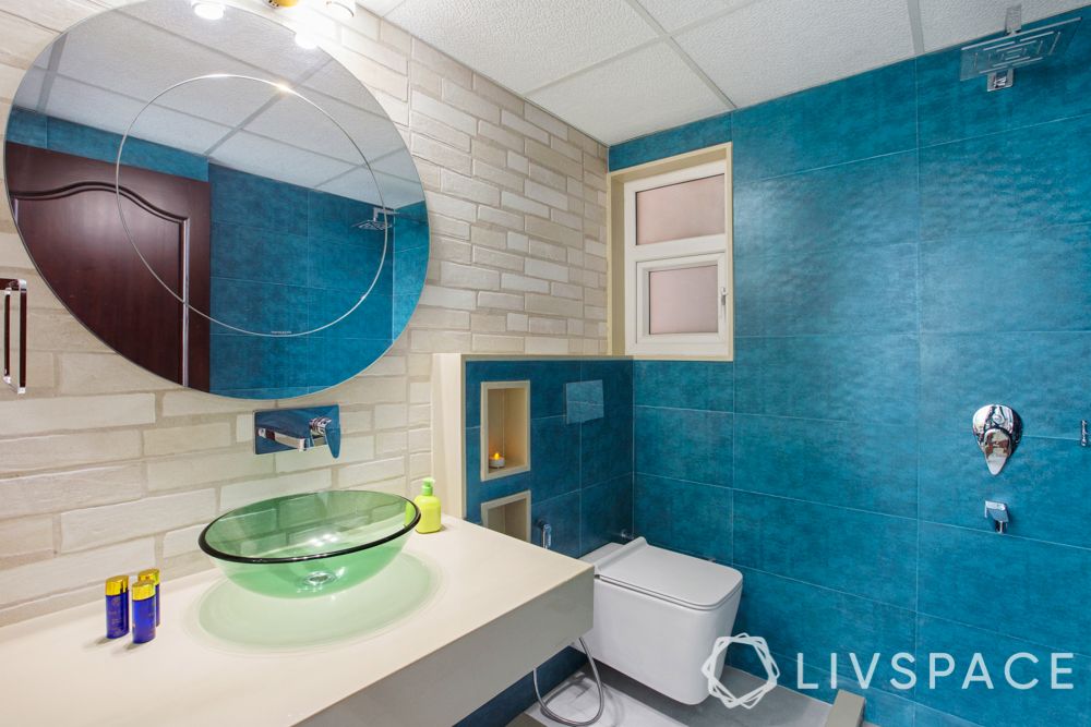 bathroom ideas-blue wall-round mirror