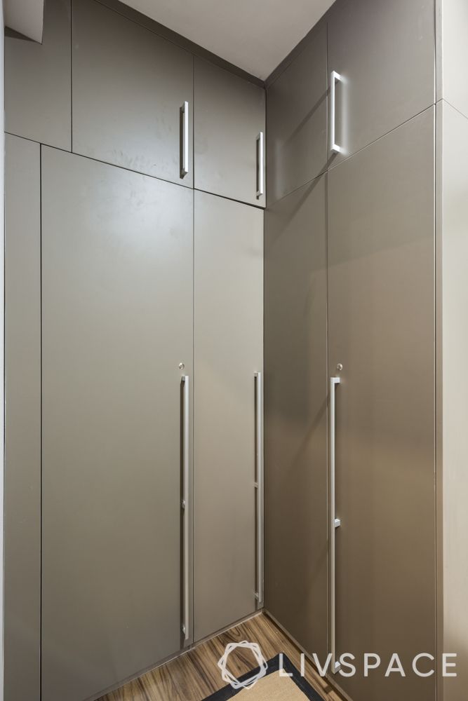 3BHK flat interiors-autumn leaf laminate wardrobe