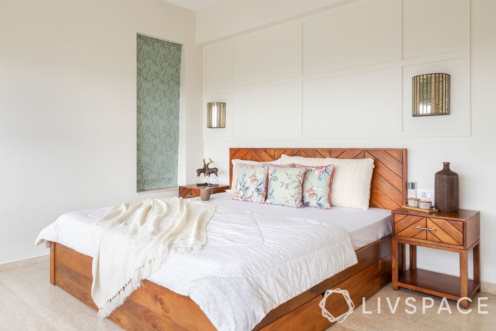 designer for homes-guest room-wooden bed-wooden table-roman blind