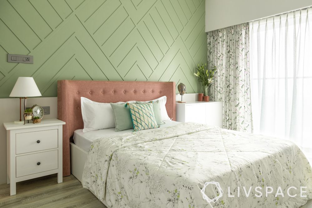 green wall-wall trims-pink headboard
