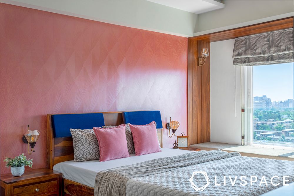 bedroom interior-pink wall paint-bay window seating
