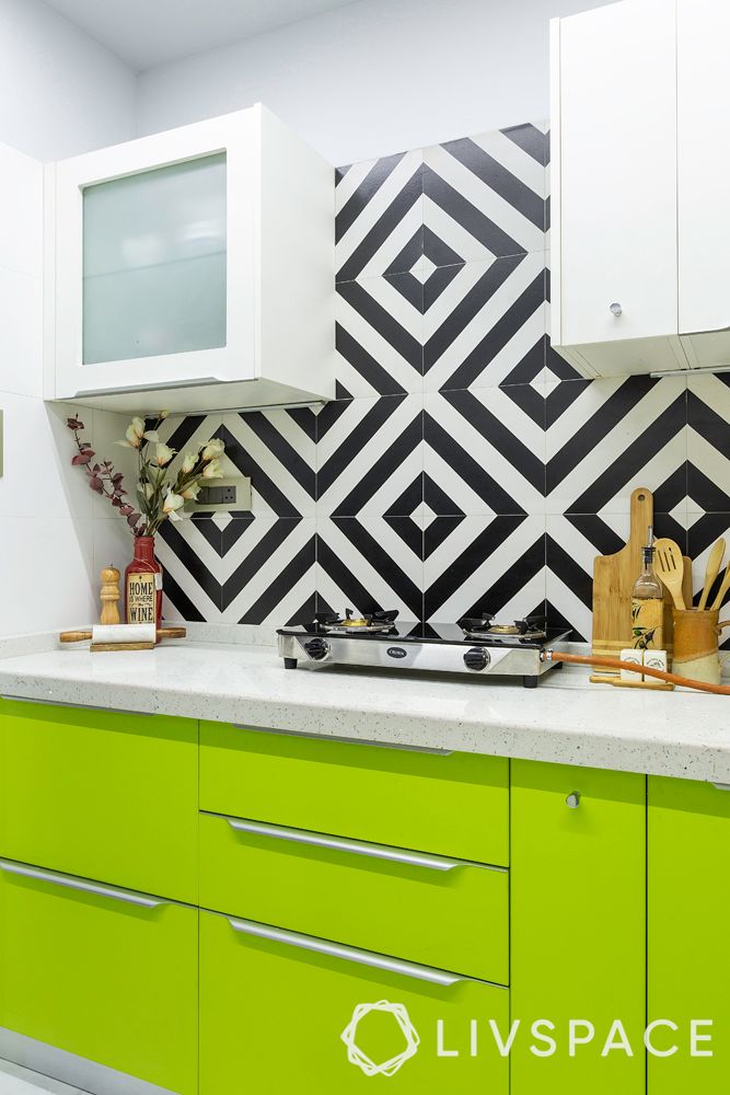 green kitchen-black and white tiles