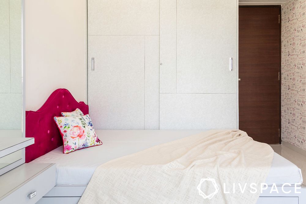 white wardrobe-pink headboard
