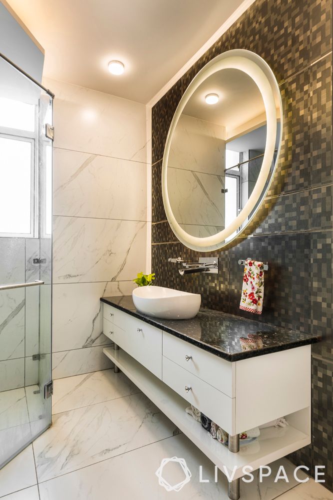 small bathroom designs India-statement mirror-sink