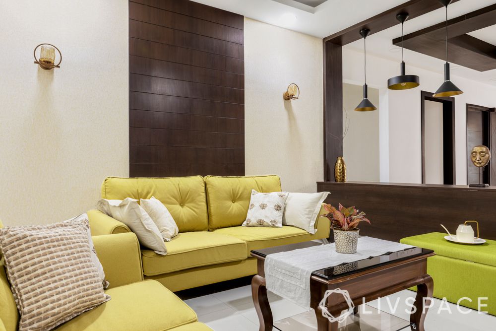 interior designing ideas-yellow couch-veneer panelling