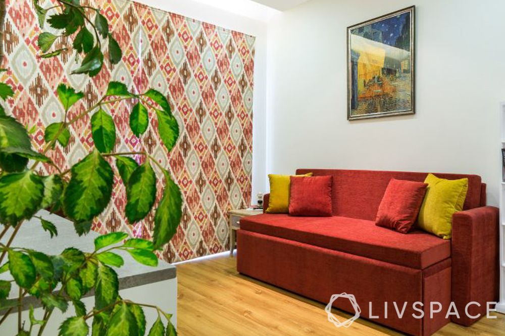 red couch-wooden flooring