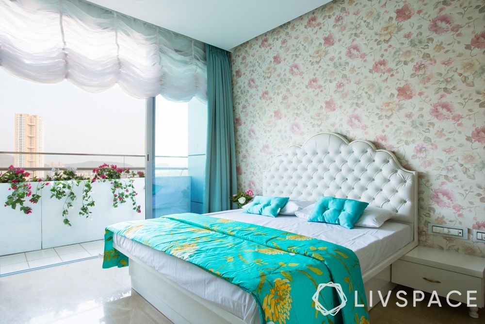 girls bedroom ideas-floral room-floral wallpaper-white headboard-turquoise bed