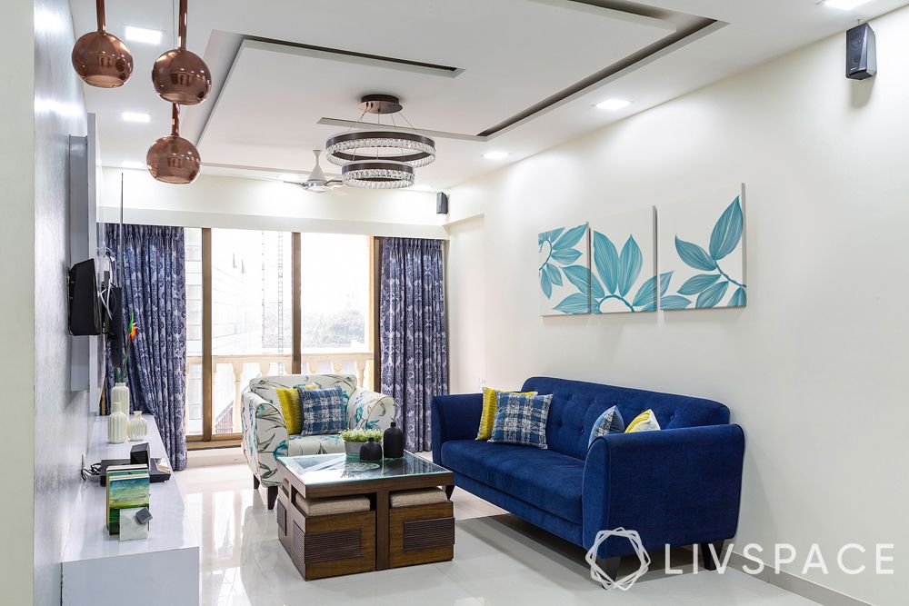 small-house-design-living-room-blue-sofa-false-ceiling