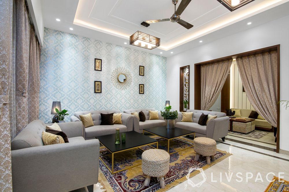drawing rooms-grey sofa-blue wallpaper