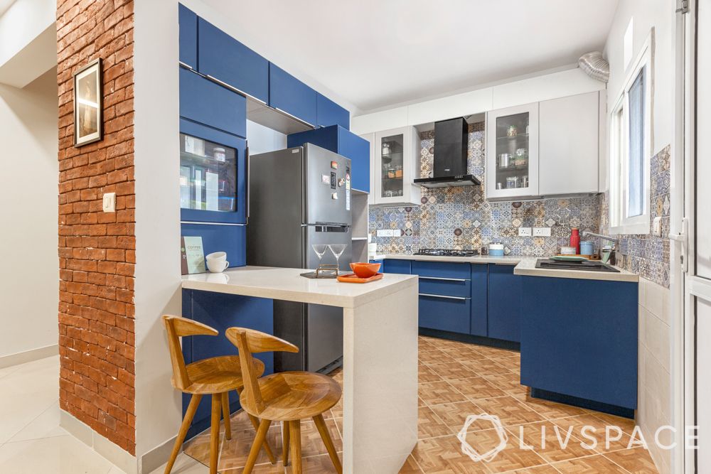 blue kitchen-breakfast counter-brick wall