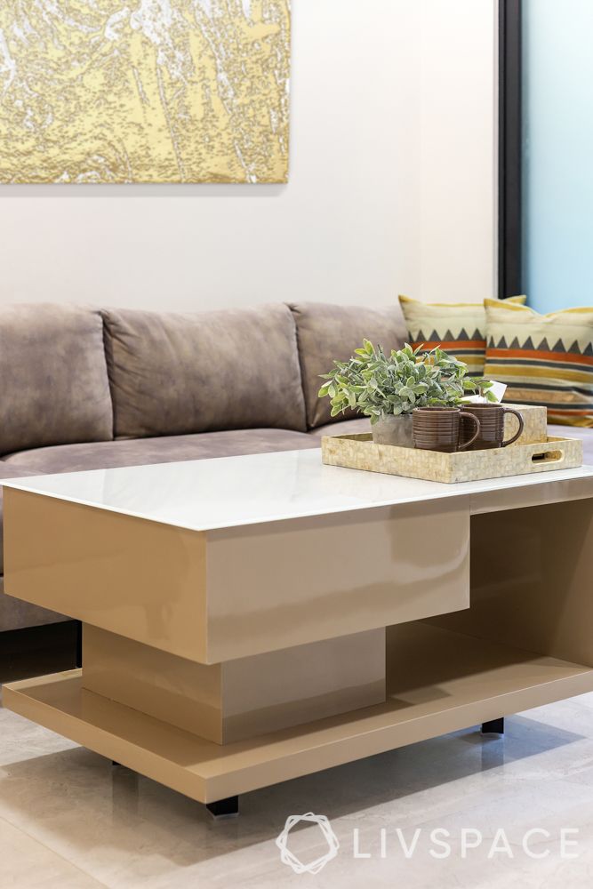 2bhk flat interior design-centre table-custom design-glossy