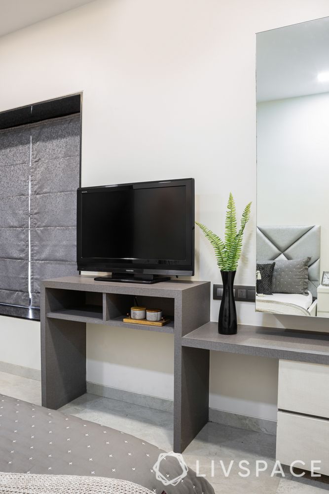 2bhk flat interior design-TV unit-dresser unit-grey