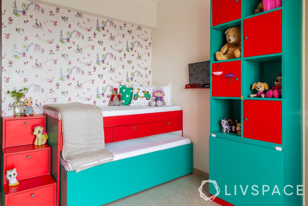 top-interior-designers-in-Mumbai-kids-room-red-and-green-trundle-bed-vertical-storage