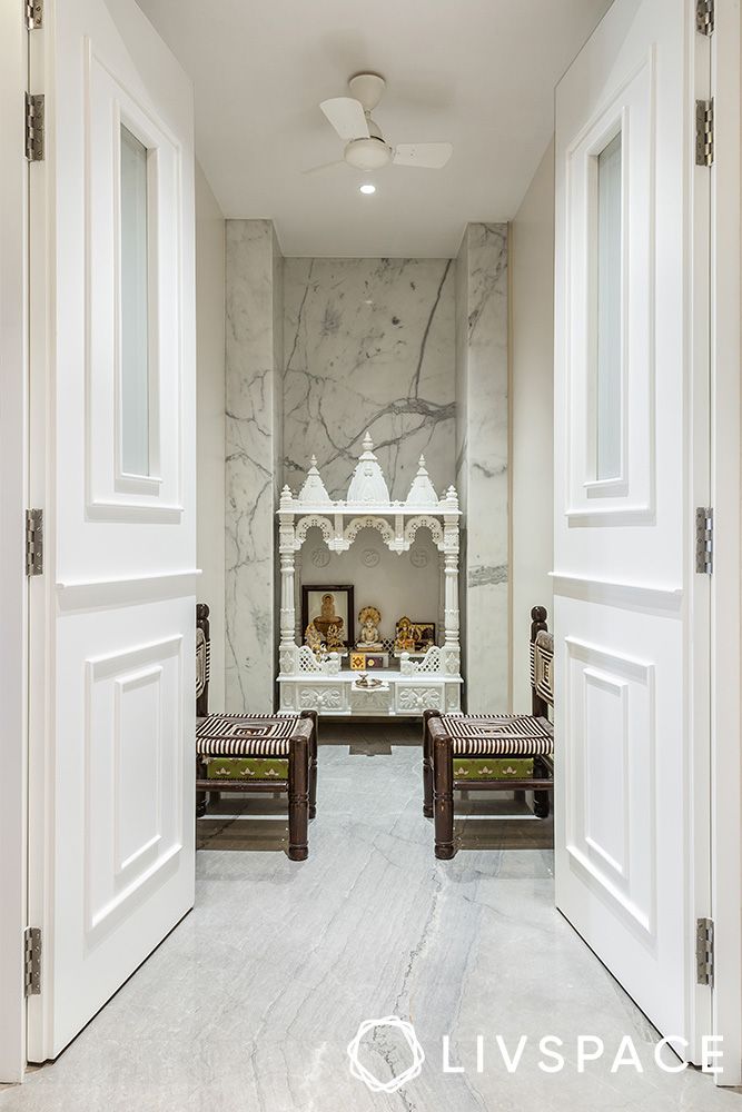white-pooja-room-doors-with-marble-walls