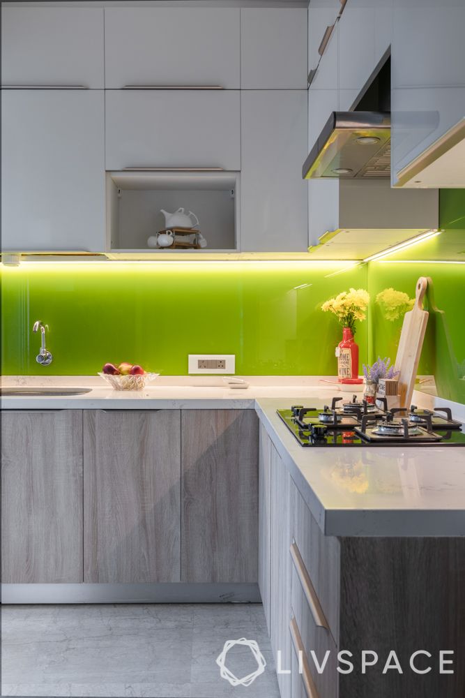 l-shaped-kitchen-design-green-backsplash-glass