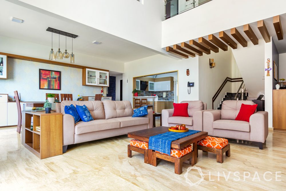 neutral couch-nested stools-wooden rafters