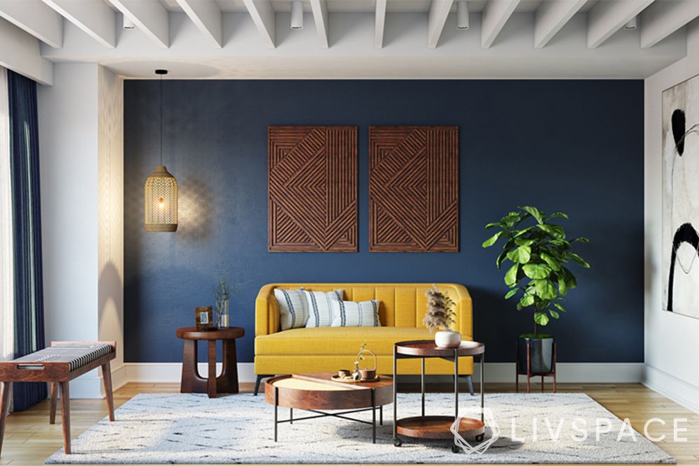 wooden false ceiling-living room-white modular rafters-blue accent wall-yellow sofa