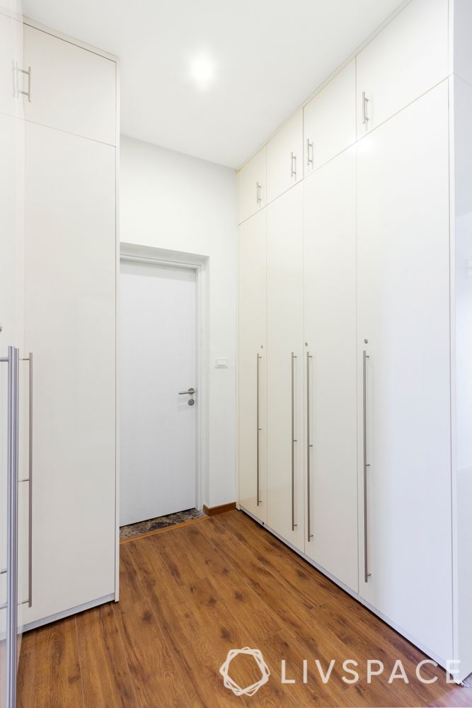 wooden flooring India-white wardrobe