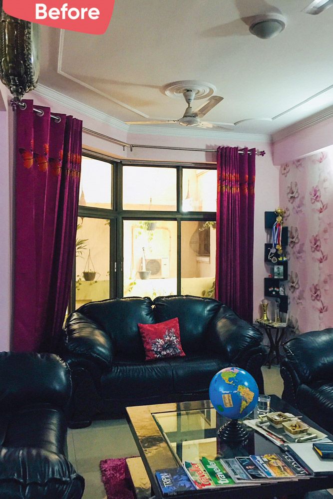 dark-gurgaon-living-room-with-black-leather-sofas