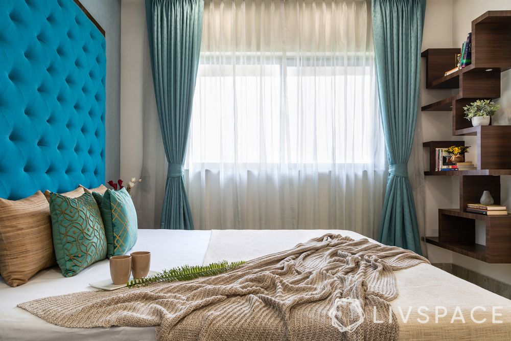 living-room-ideas-compact-bedroom-blue-headboard-curtains