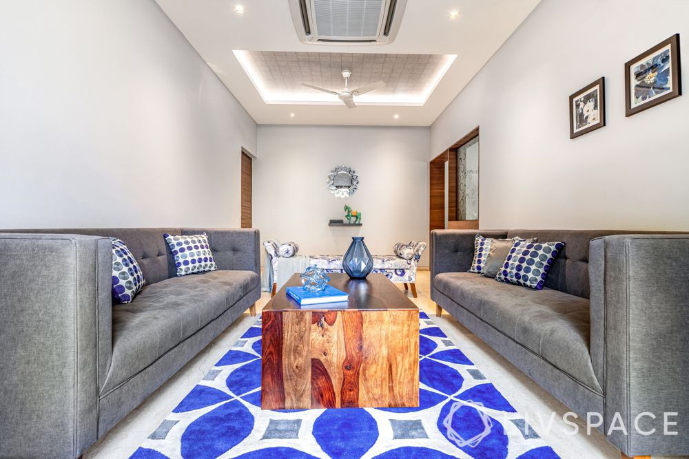  small living room-grey sofa-blue rug