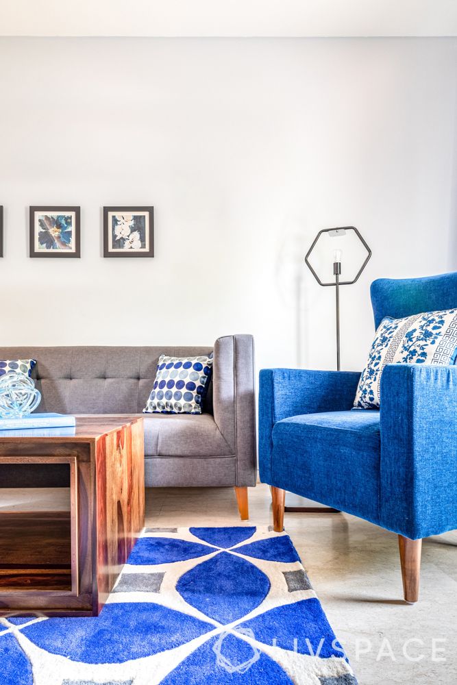 blue armchair-blue rug-black floor lamp